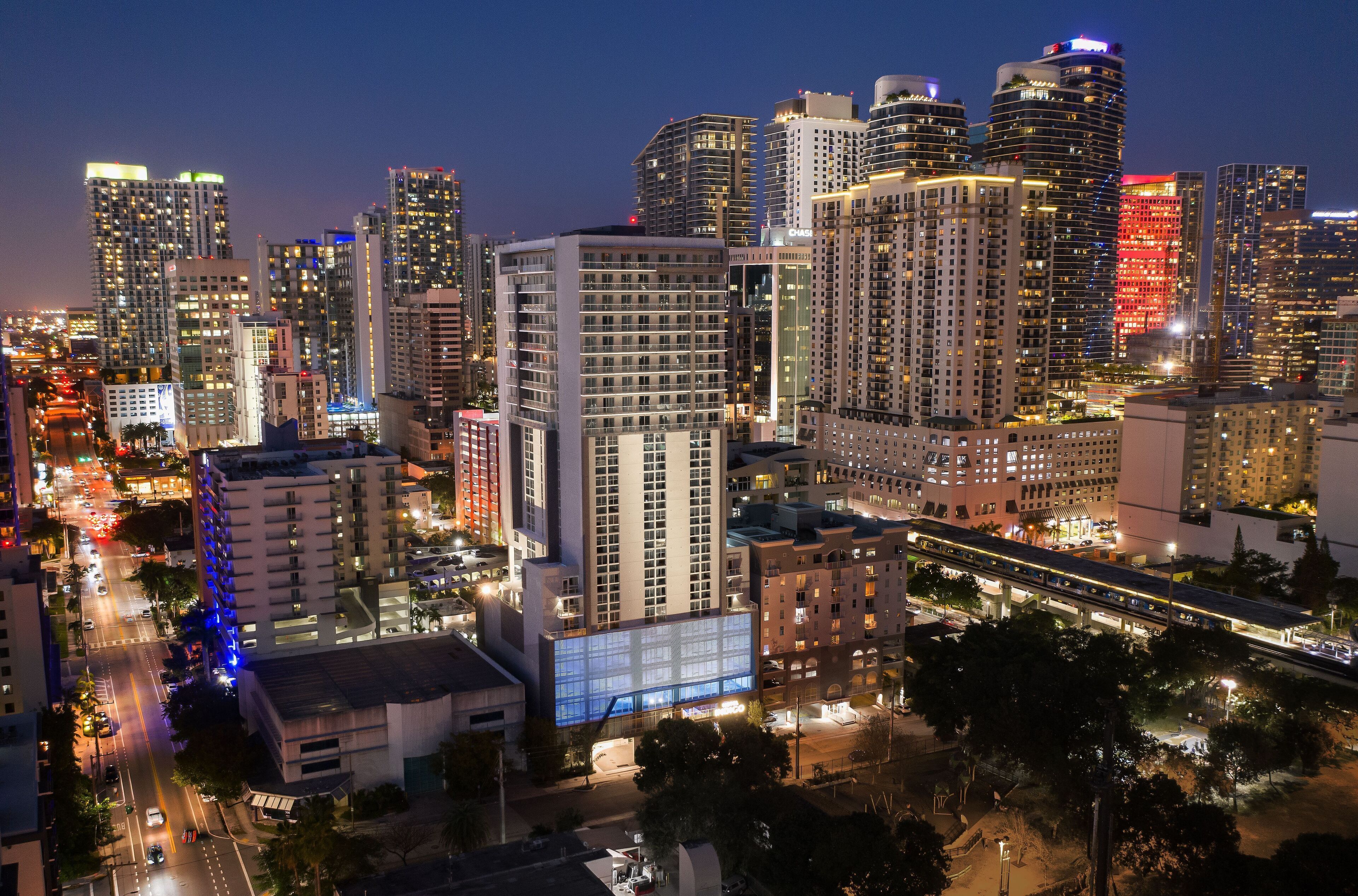Hotel exterior at night at Atwell Suites Miami Brickell