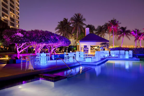 Pool at night at Hilton Miami Airport Blue Lagoon